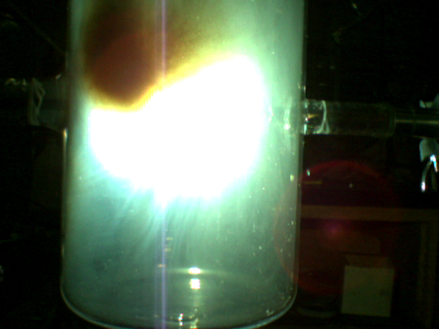 Lead rods, which are infused with the material to be encapsulated in hollow carbon molecules known as fullerenes, are blasted with a plasma arc. The resulting soot contains the filled carbon molecules. The remote-control process was invented to insert radiolabeled materials into fullerenes for use in diagnosing and treating tumors. Brain tumors are the target of the NIH-funded research being carried out by a Virginia Tech-Virginia Commonwealth University team.