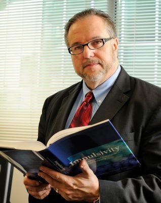 man with book