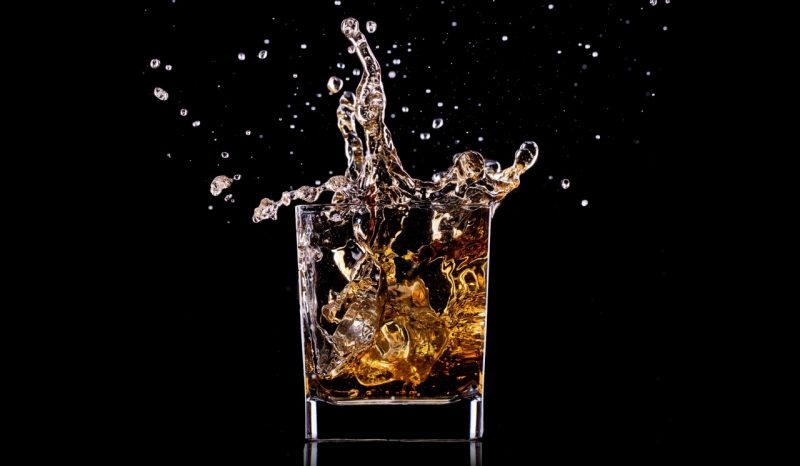 A splashing glass of alcohol