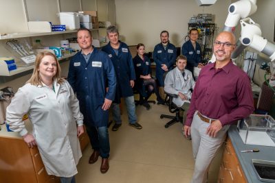 Professor Steven Poelzing (right) led a study published in the journal JACC  Clinical Electrophysiology that challenges the idea that all age-related changes in the heart are harmful. Fralin Biomedical Research Institute Vascular and Heart Center researchers include (from left): Research Project Associate Chandra Bain, Research Associate Professors Gregory Hoeker and Mark Warren; Translational Biology, Medicine, and Health graduate students Rowan Maisonneuve, Max Albrecht, and Alec Beck (seated), and postdoctoral associate Xiaobo Wu.