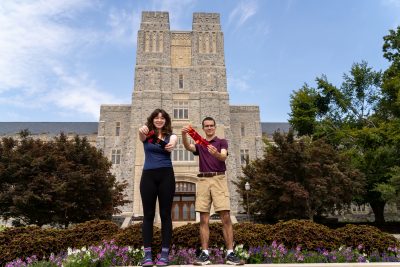 (From left) Hokie Socks designers, Jake Sousa and Abigail Bollinger, with their socks.